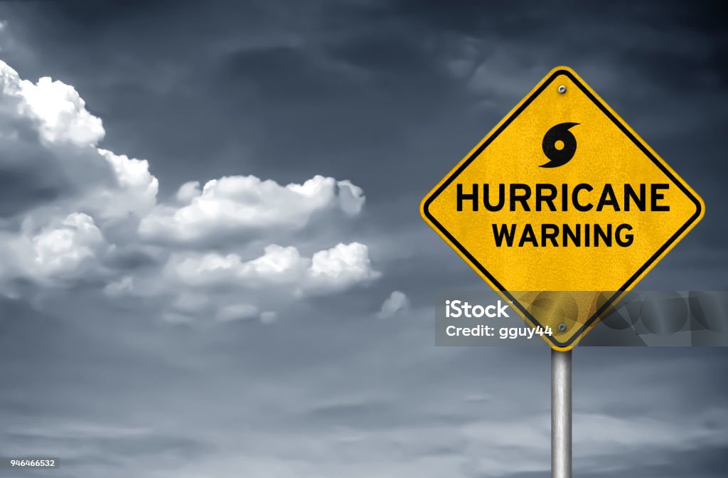 Segnale stradale di avvertimento per l'uragano - Foto stock royalty-free di Uragano