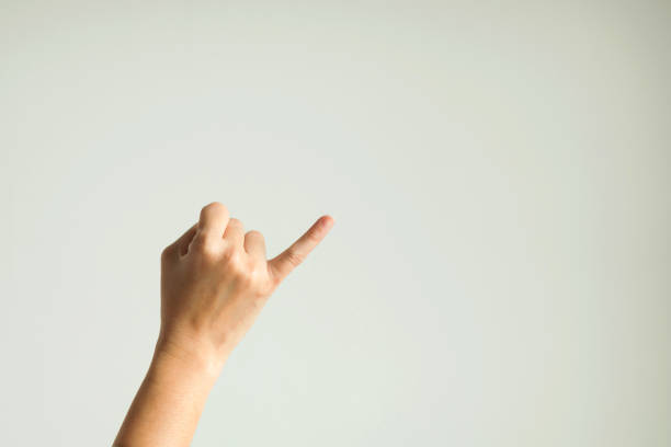 hand sign hook each other's little finger Hand sign showing little finger waiting for another to hook little finger together that meaning of promise and meaning asking for reconciled to someone. pinky finger stock pictures, royalty-free photos & images