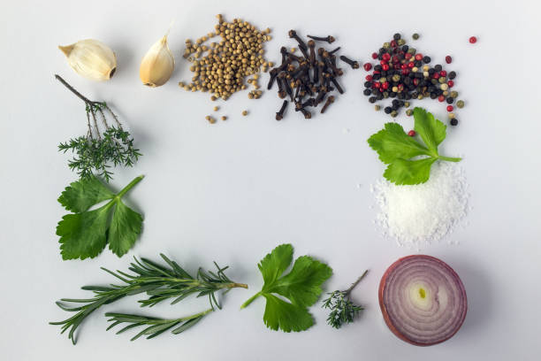 istock Various spices and herbs on white background with copy space. Concept is a healthy varied diet. 946483158