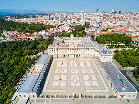 The Royal Palace of Madrid aerial panoramic view. Palacio Real de Madrid is the official residence of the Spanish Royal Family in Madrid, Spain