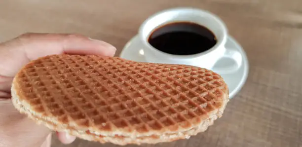 Photo of Stroopwafel a famous waffle from dutch. Eat it with black coffee.