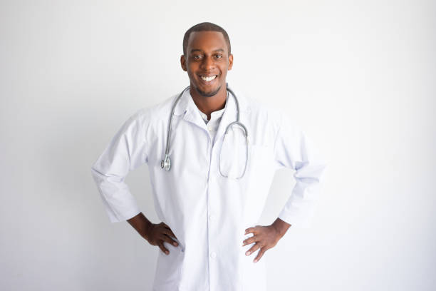 istock Smiling handsome young black male doctor 946502818
