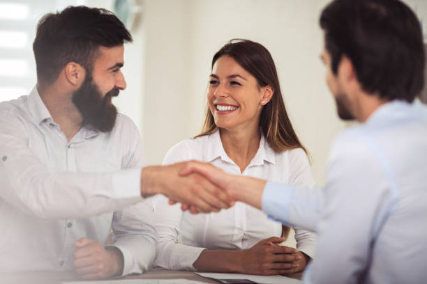 istock Business people shaking hands 946502870