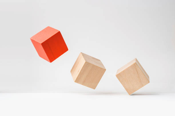 abstract geometric real wooden cube with surreal layout on white floor background