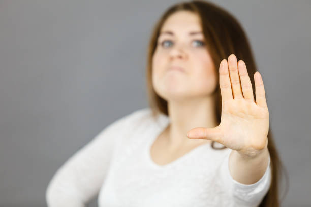 istock Angry apodicticity woman showing stop with hand 946517428