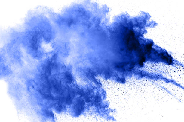 istock abstract blue dust explosion on  black background ,abstract blue powder splattered on black background , Freeze motion of blue powder exploding. 946535668