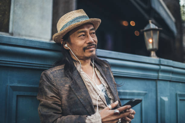 istock Mature man relaxing outdoors 946542520