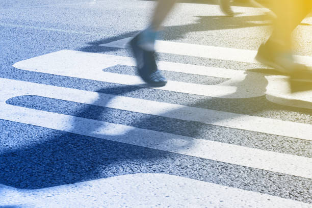 istock closeup on marathon runners legs and feet with motion blur 946549510