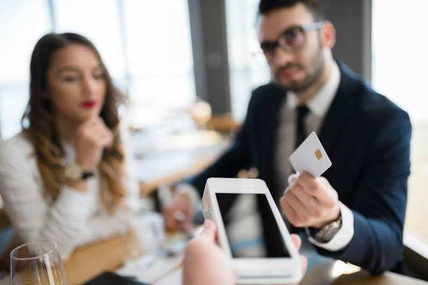 istock Business consultants making contactless payment 946552836
