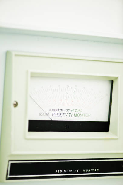Distance Laser Measuring instrument on wooden surface