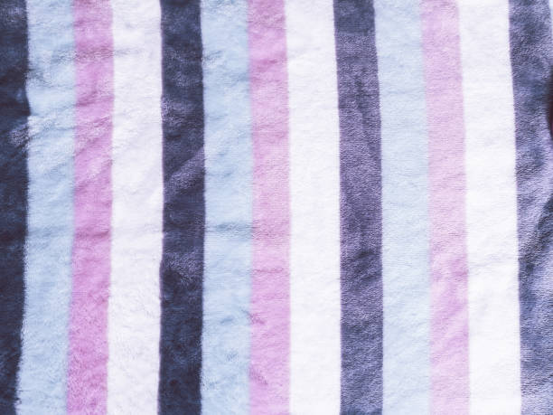 istock fur, feather and wool fabric texture background,crumpled fabric background. 946559506
