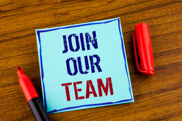 istock Word writing text Join Our Team. Business concept for Get over unemployment joining better career workforce written on Sticky note paper on the Wooden background Marker next to it. 946560456