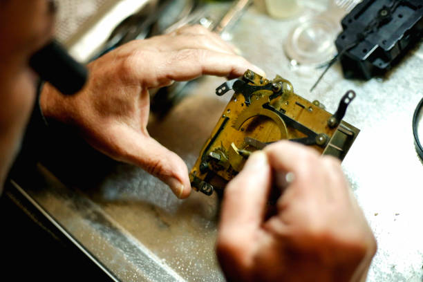 istock Watchmaker is repairing the mechanical watches in his workshop 946563326