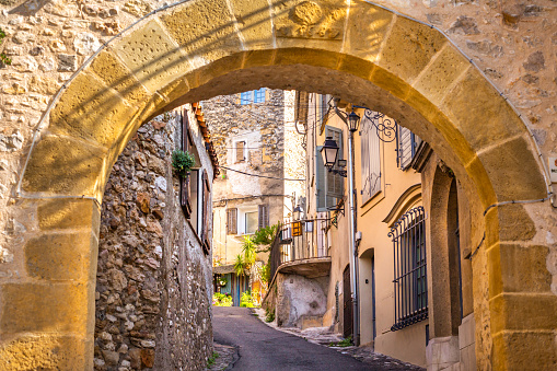 Medieval stone arch at a street in Biot, France