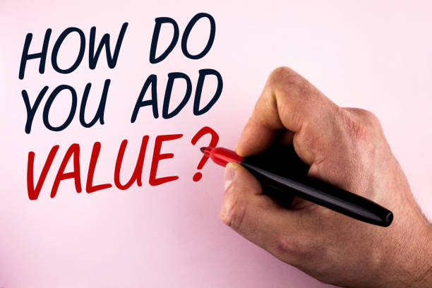 istock Word writing text How Do You Add Value Question. Business concept for Bring business progress contribute earn written by Man holding Marker in Hand on plain background. 946567922