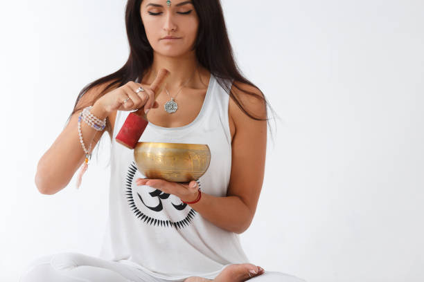 istock Beautiful young woman doing yoga 946568818