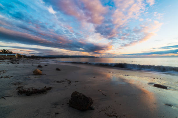 istock Pink clouds over the sea at sunset 946568872