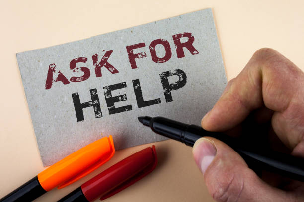 istock Conceptual hand writing showing Ask For Help. Business photo text Use powers completely taking support from people around you written by Man with Marker on Cardboard Piece on plain background 946568892