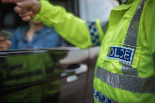 istock Young woman pulled over by police 946570608
