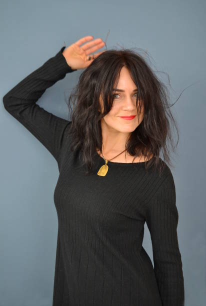 istock Woman in a dark dress 946573344