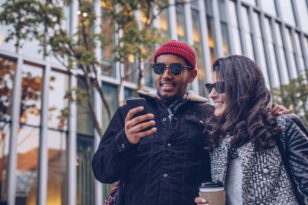 istock Friends having fun in the city 946574234