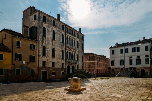 Colourful and historic houses at the Campo della Maddalena in Venice, Italy, with a variety of shapes and sizes in the local architecturural style