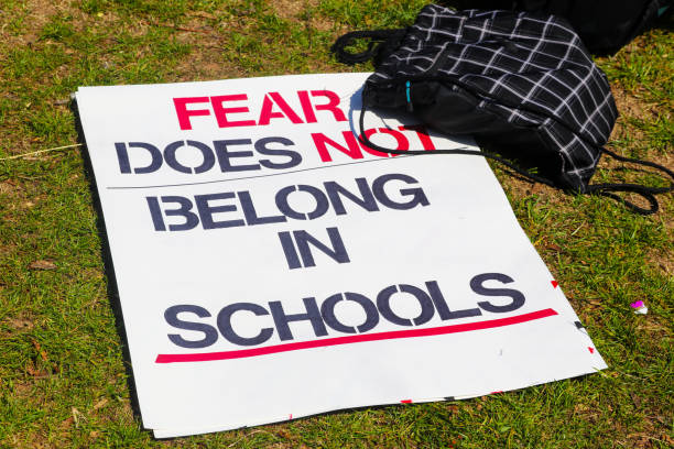 istock Backpack and sign on ground at March for Life protest 946586022
