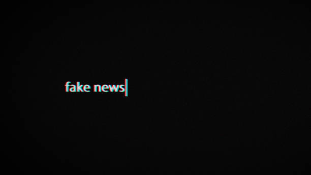 fake news text laptop screen fake news text laptop screen with glitch effect and black background fake news stock pictures, royalty-free photos & images