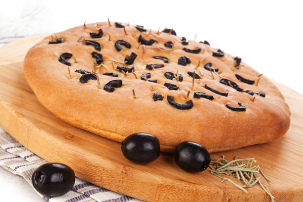 istock Italian foccacia bread with black olives. 946592918