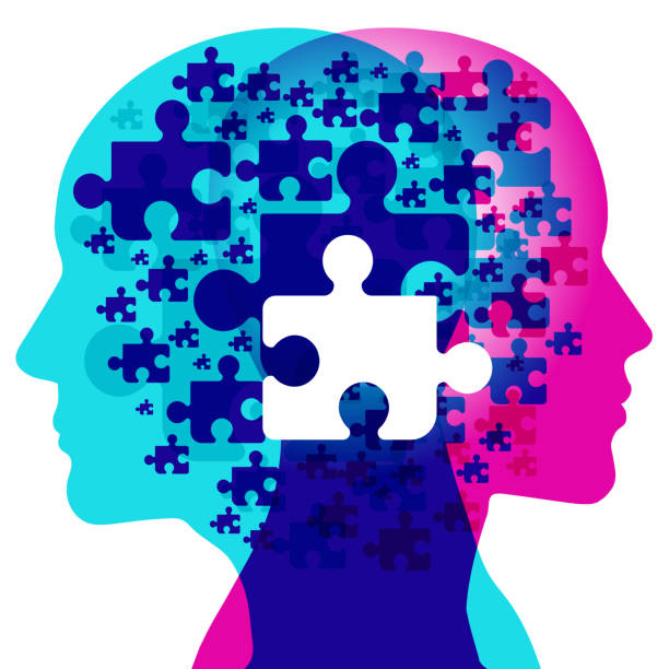 Lost Mind Piece A male and female side silhouette positioned back to back, overlaid with various sized jigsaw puzzle shapes. A white jigsaw piece is centrally positioned overlapping the detail pattern of shapes. health crisis stock illustrations