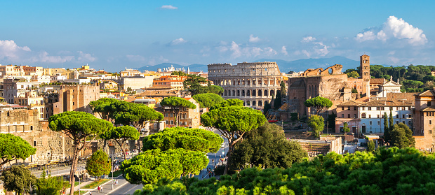 Castel Sant'Angelo and Ponte Sant'Angelo in downtown Rome Italy at twilight blue hour.