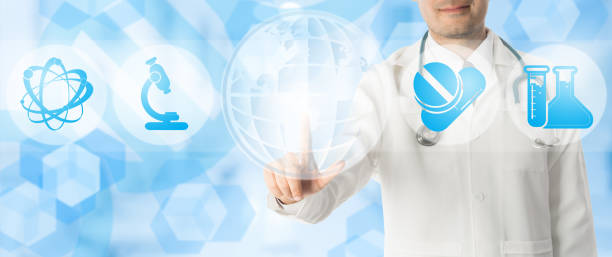 istock Doctor Points at Copy Space with Medical Icons 946597538