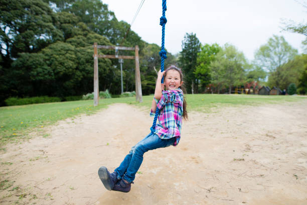 istock Little girl playing in the park 946604882