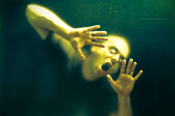 istock Scary undead zombie man 946610554