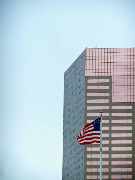 istock office building with American flag 946611260