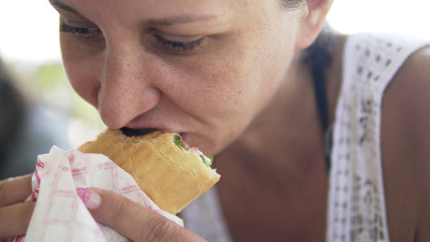 istock Eating Wraped  Chicken Doner Diner Sandwich 946613876