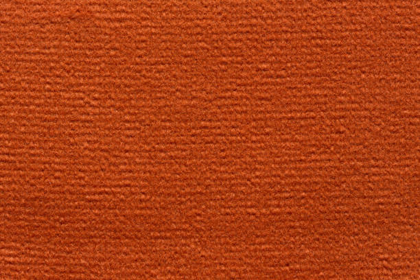 istock Saturated fabric texture in warm orange colour 946614118