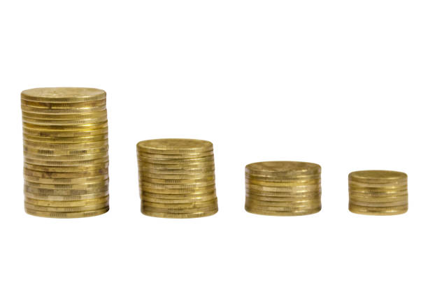 istock Stacks of golden coins isolated on white background 946618436