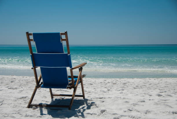 istock Sandestin Beach, Florida - Beach Chair 946621212