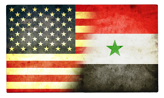 A stock photo/3D rendered image of the USA and Syrian flag.