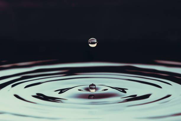 istock QUEBEC, QC - Canada December 2012 : Aftermath of a drop over ripples of water. 946624380