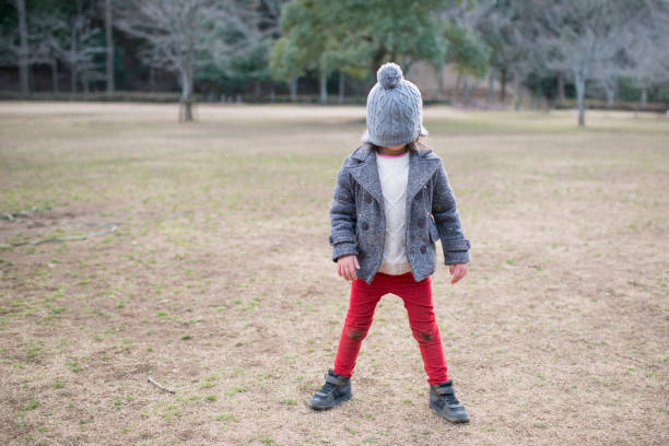 istock Little girl playing in the park 946636534