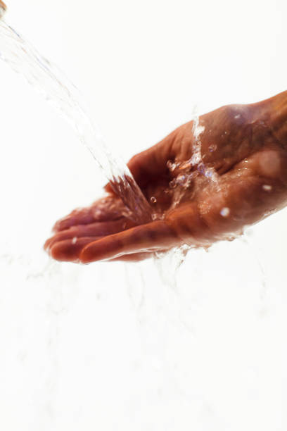 istock Close-Up Of Washing Hands 946637412