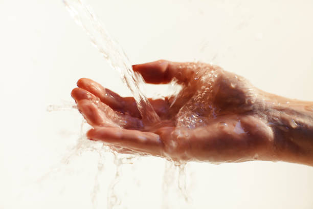 istock Close-Up Of Washing Hands 946637432
