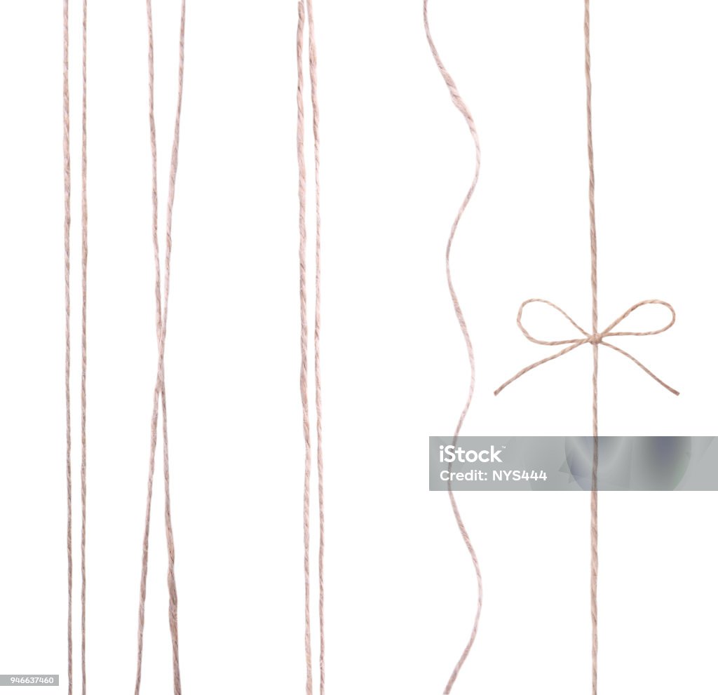 String twine rope isolated. String twine rope bow isolated on white.Decoration gift present element.Parcel tied fiber. String Stock Photo