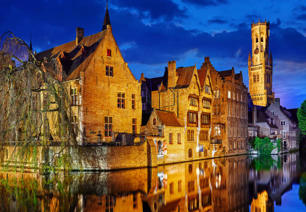 istock Bruges Belgium evening sunset with blue sky 946640892