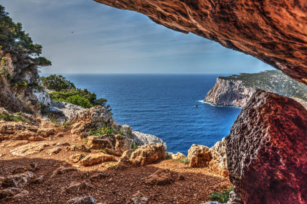 istock Blue sea seen from a cave in Capo Caccia 946644182
