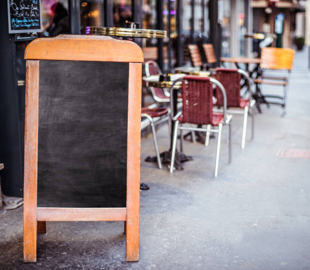 istock blank blackboard street sign 946644356