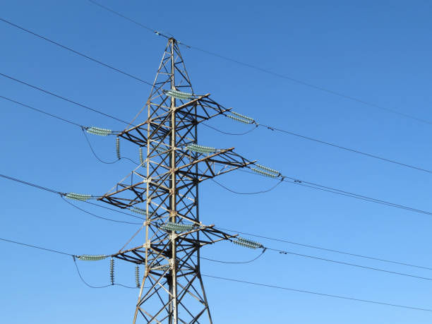 istock Power line support against the clear blue sky 946644582