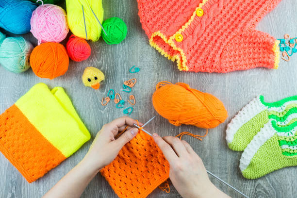 istock girl knits sock knitting needles 946648016
